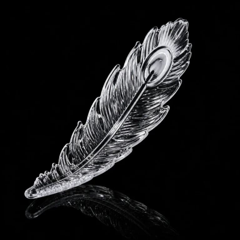 Clear polished feather shaped crystal module with textured detail